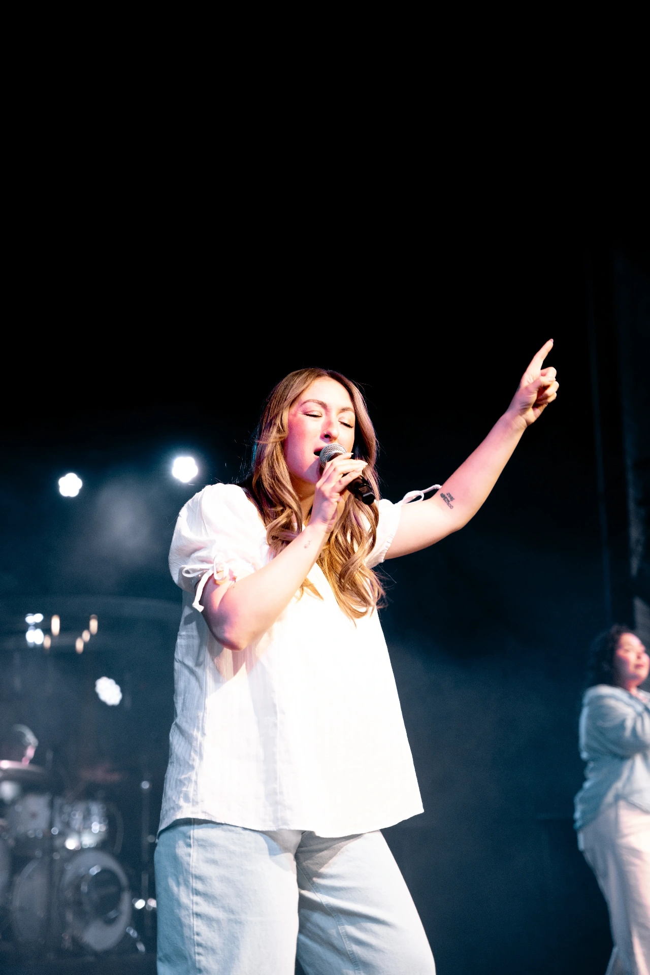 Worship leader singing